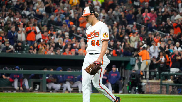 Sep 28, 2023; Baltimore, Maryland, USA; Baltimore Orioles pitcher Dean Kremer (64) walks to the dugout after being taken out of the game during the sixth inning against the Boston Red Sox at Oriole Park at Camden Yards. Mandatory Credit: Gregory Fisher-USA TODAY Sports